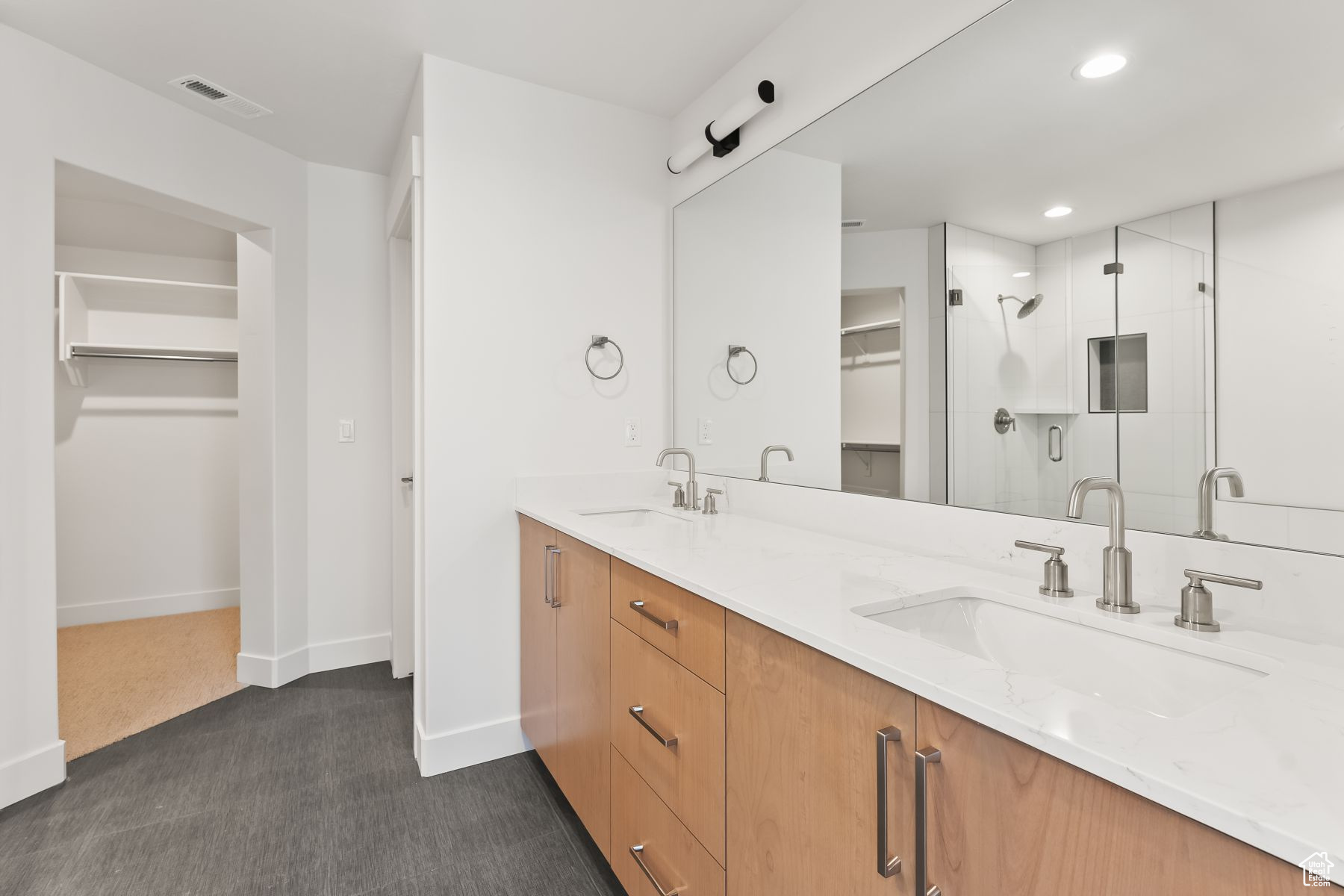 Master Bathroom featuring vanity and walk in shower