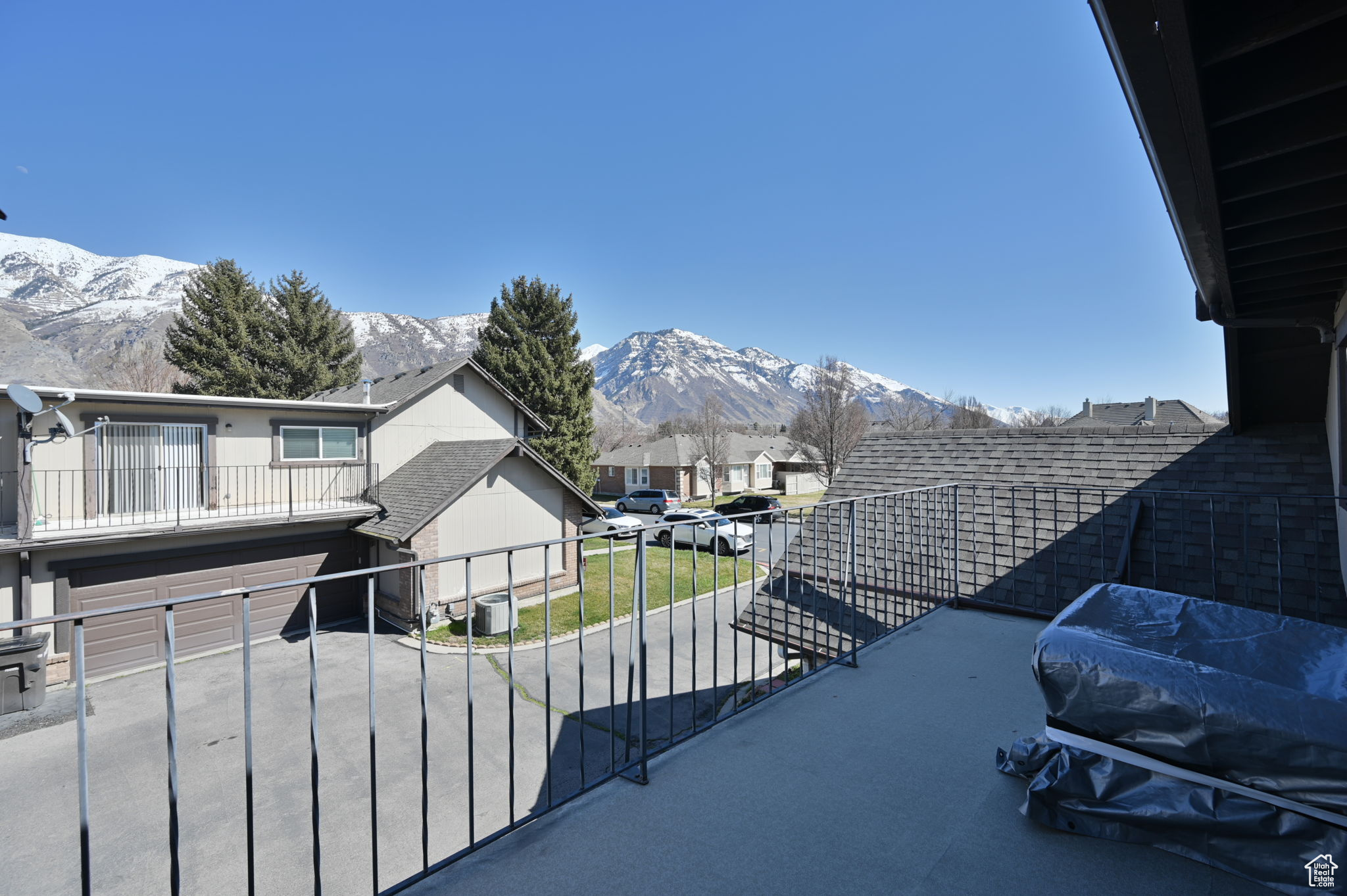 View of patio / terrace featuring a mountain view, a balcony, and area for grilling