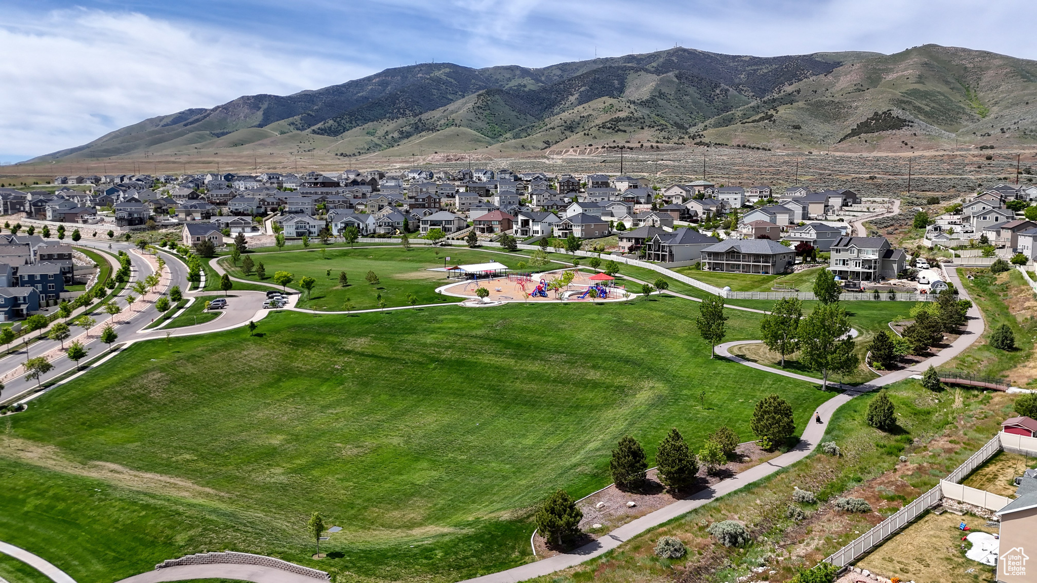 Birds eye view of property with a mountain view