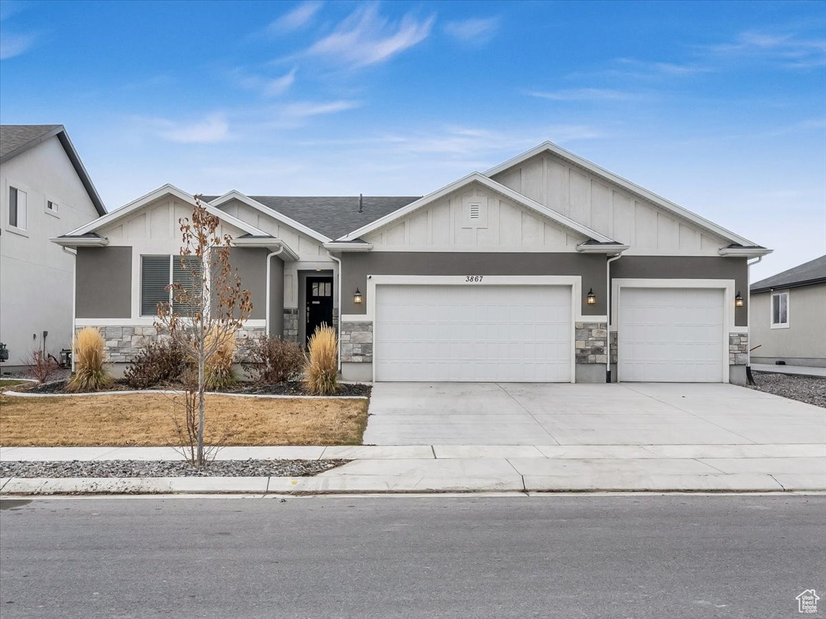 View of front of property with a garage