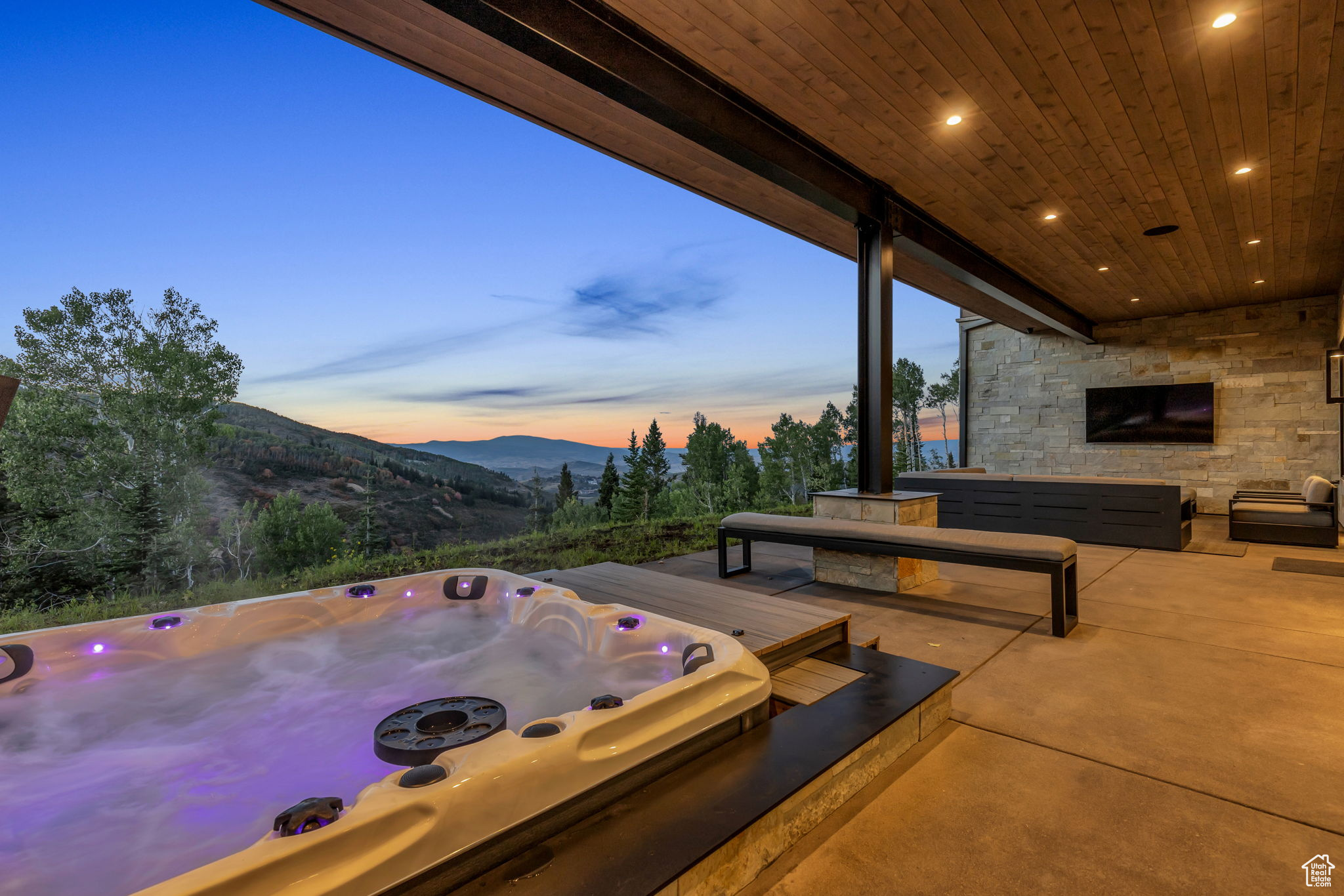 View of patio featuring a hot tub