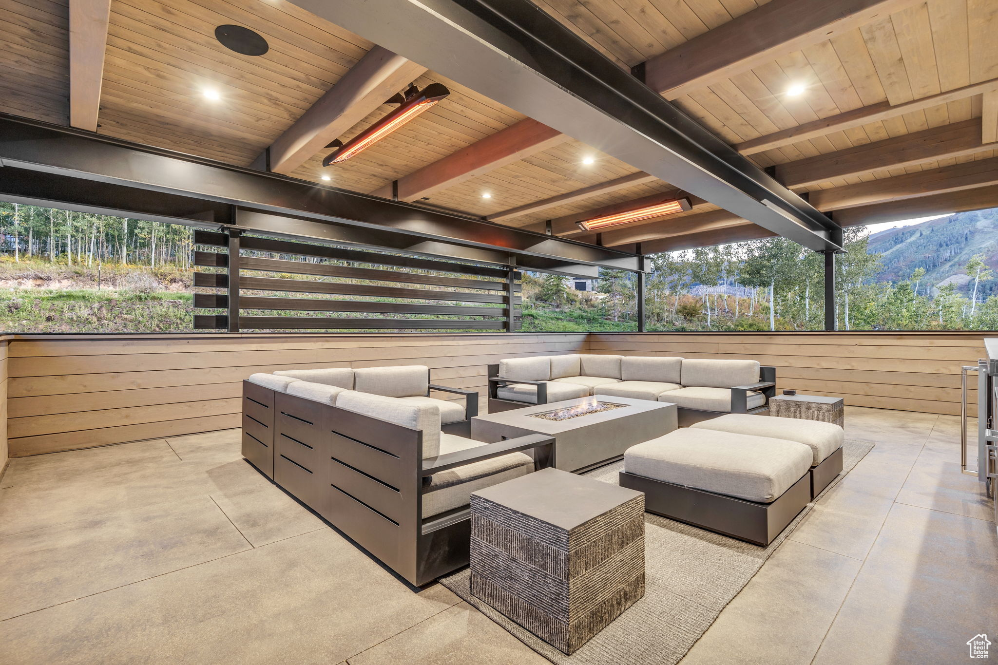 View of patio / terrace featuring an outdoor living space with a fire pit