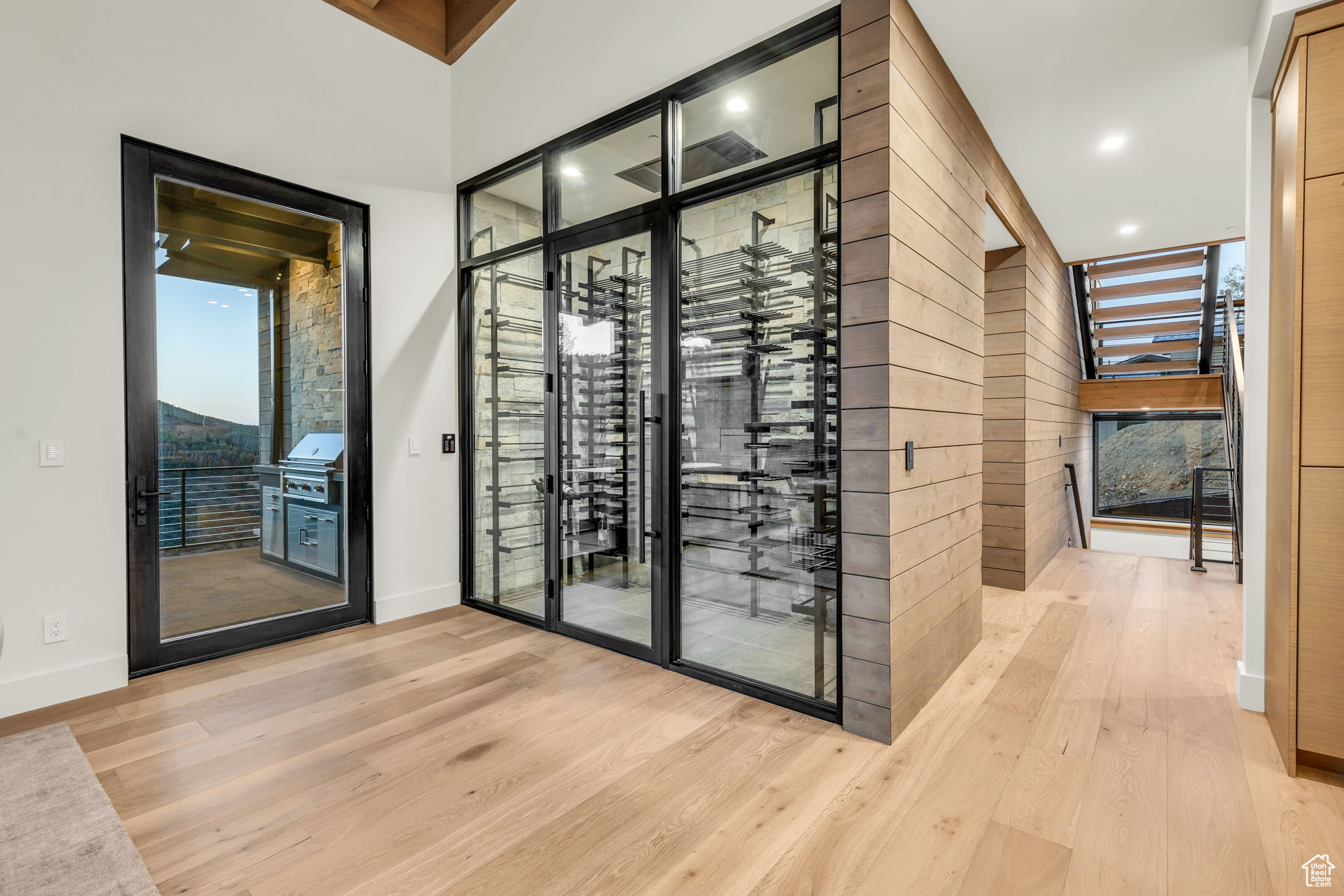 Wine cellar featuring light hardwood / wood-style flooring