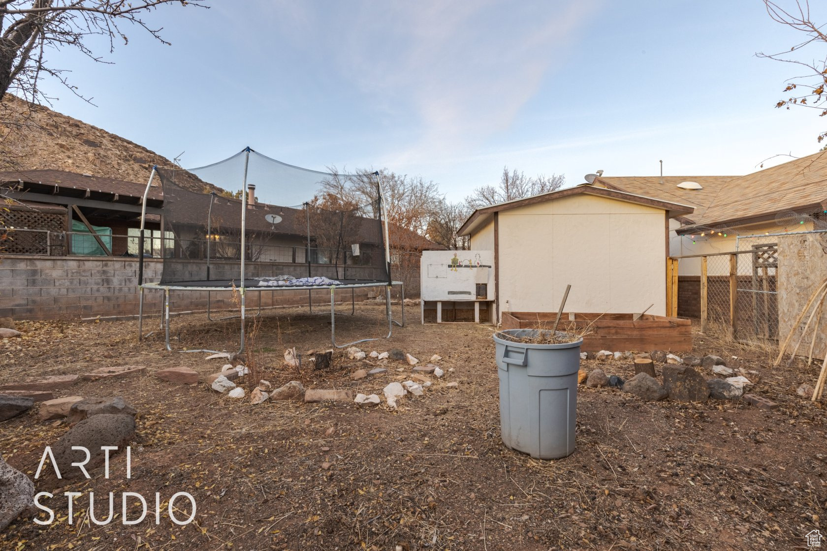 View of yard featuring a trampoline