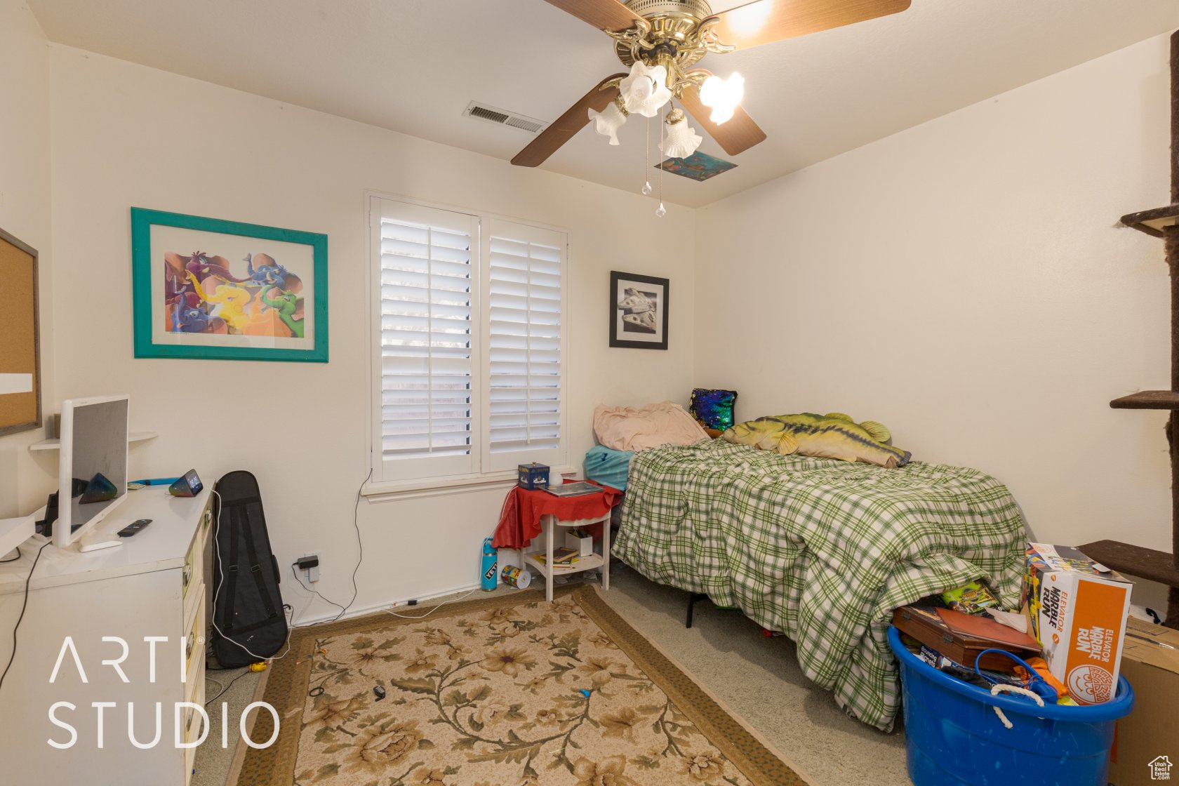 Bedroom with carpet and ceiling fan