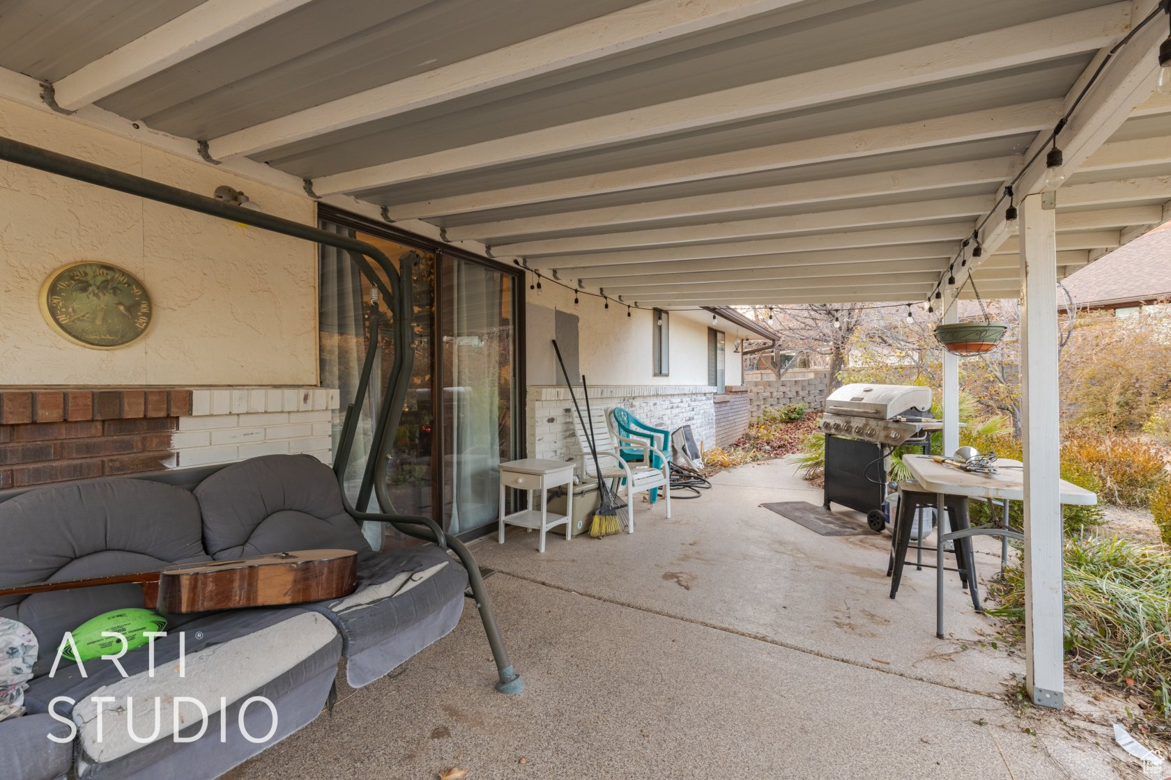 View of patio with area for grilling