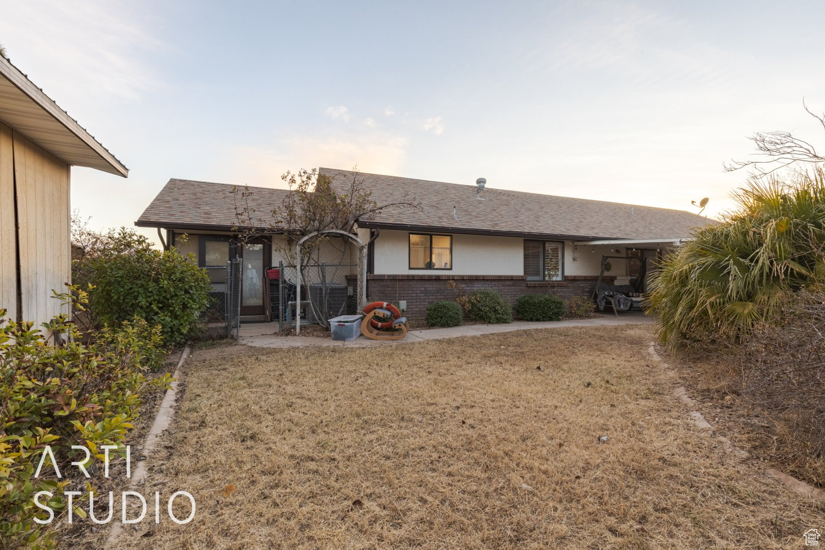 Ranch-style house featuring a lawn