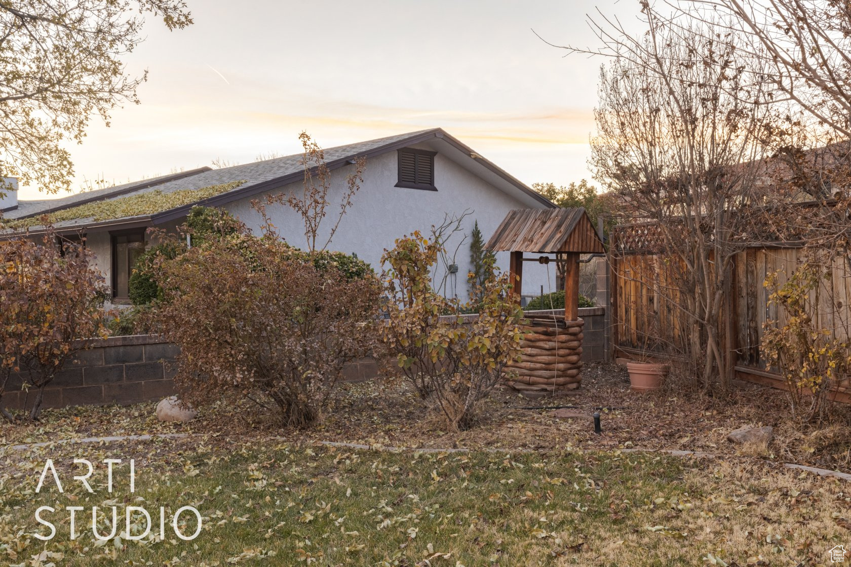 View of property exterior at dusk