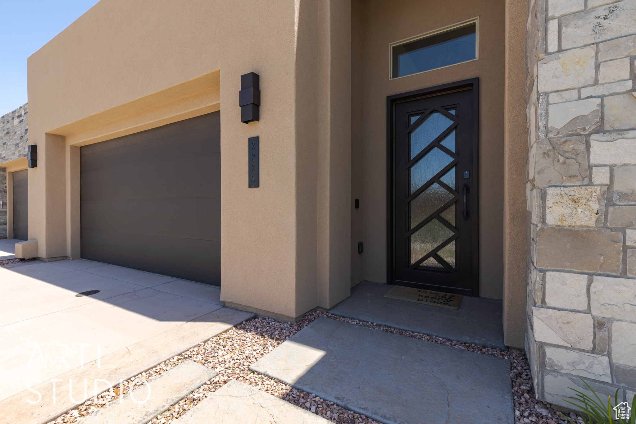 Entrance to property with a garage