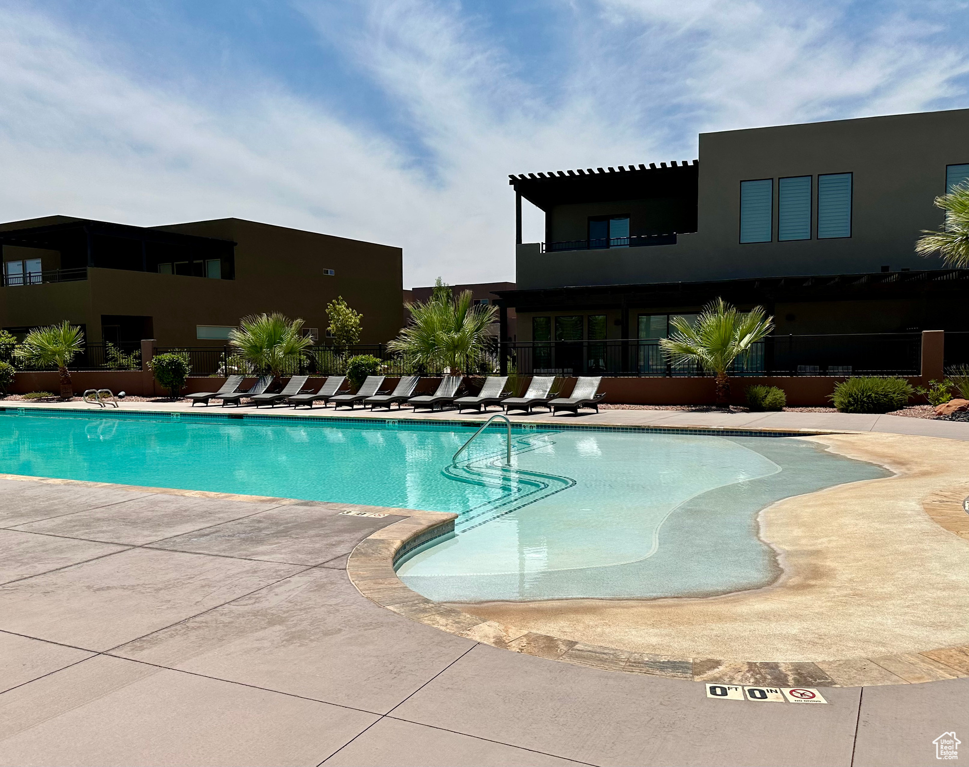 View of Beach swimming pool featuring a patio