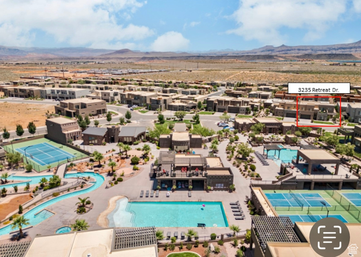 Birds eye view of property featuring a mountain view