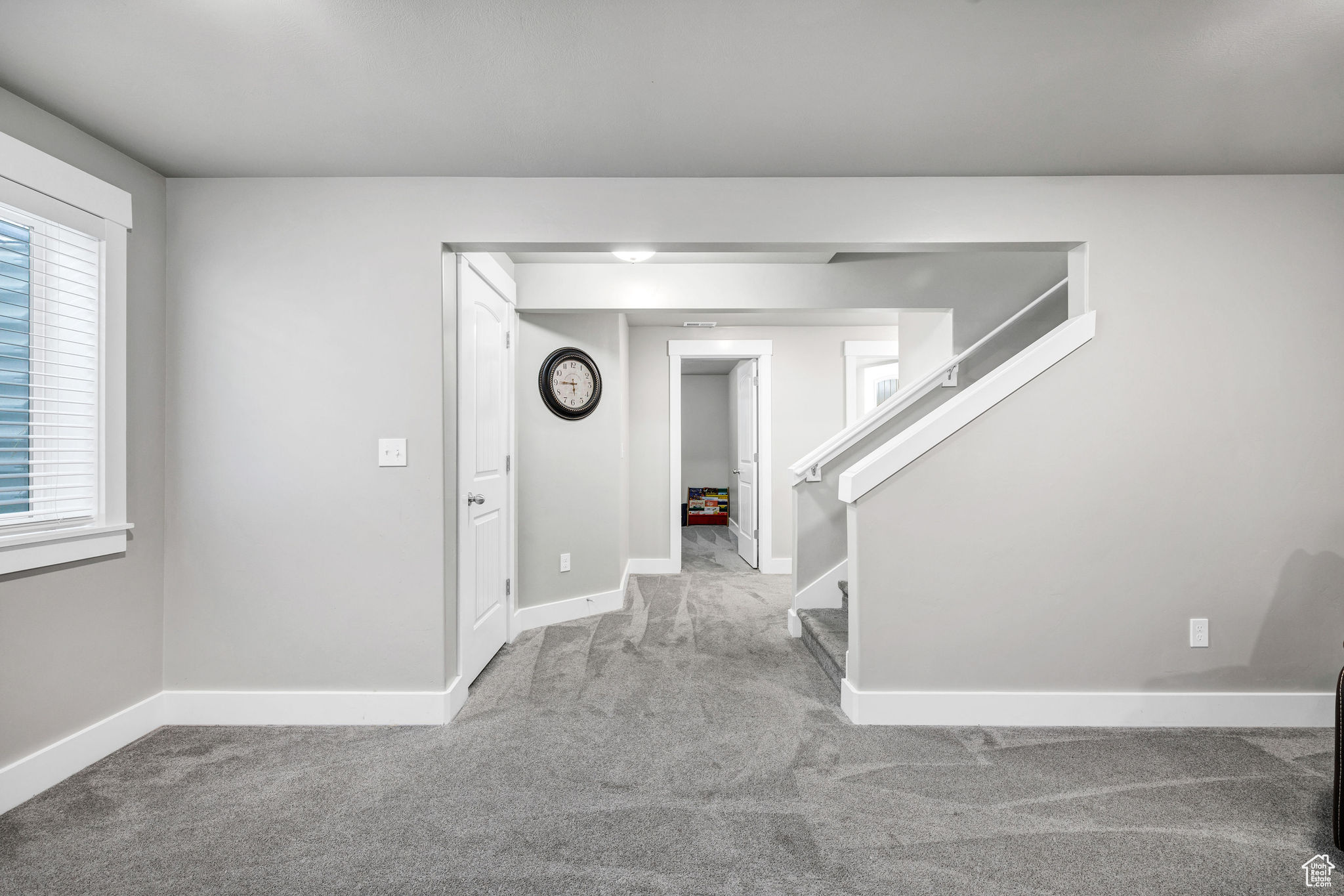 View of carpeted entrance foyer