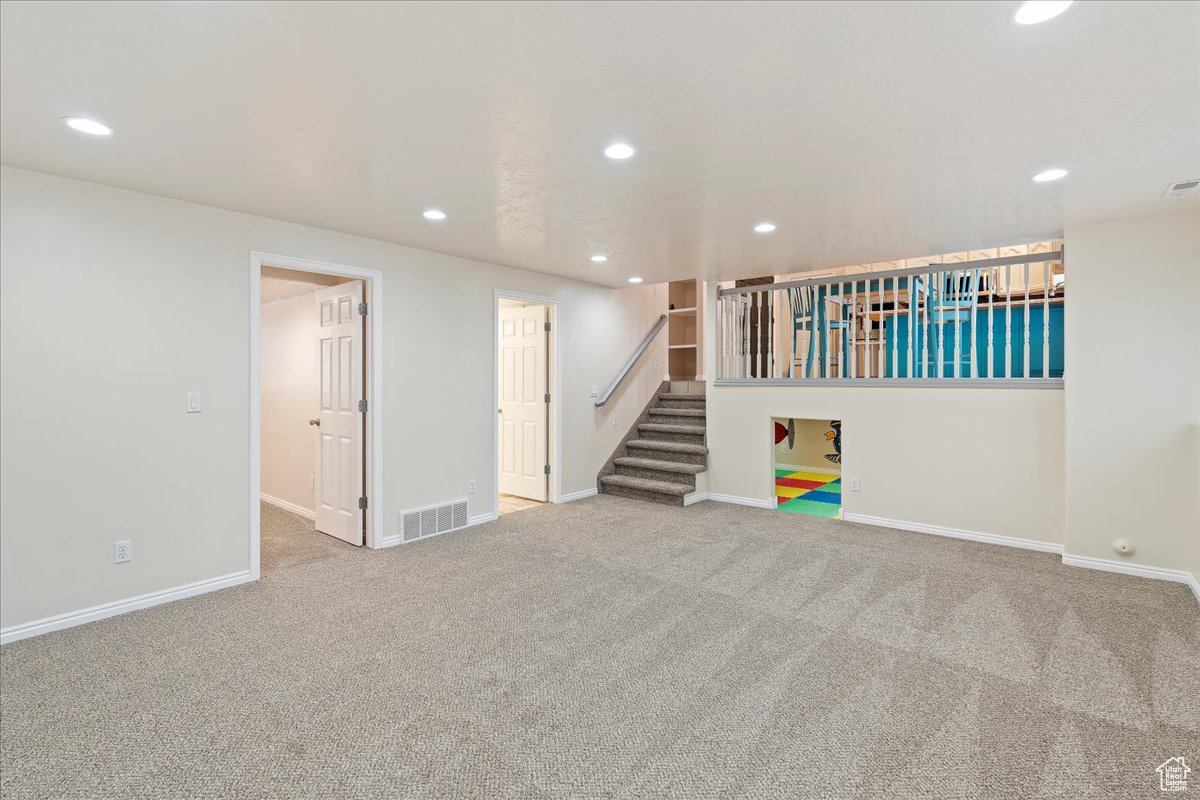 Basement featuring carpet floors