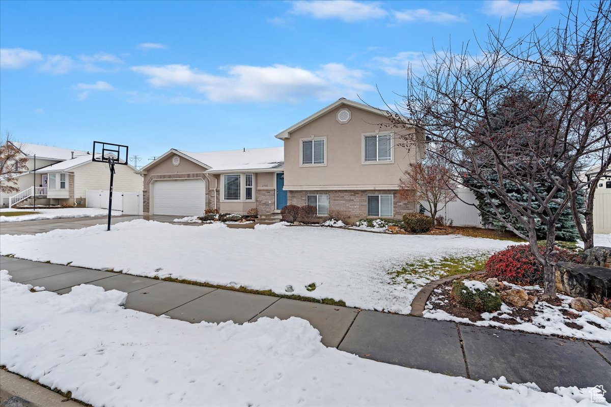 View of front of house with a garage