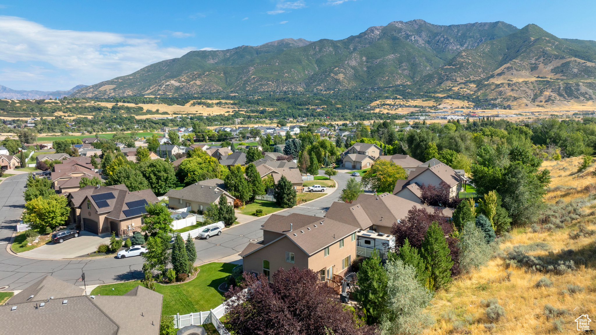 Birds eye view of property with a mountain view