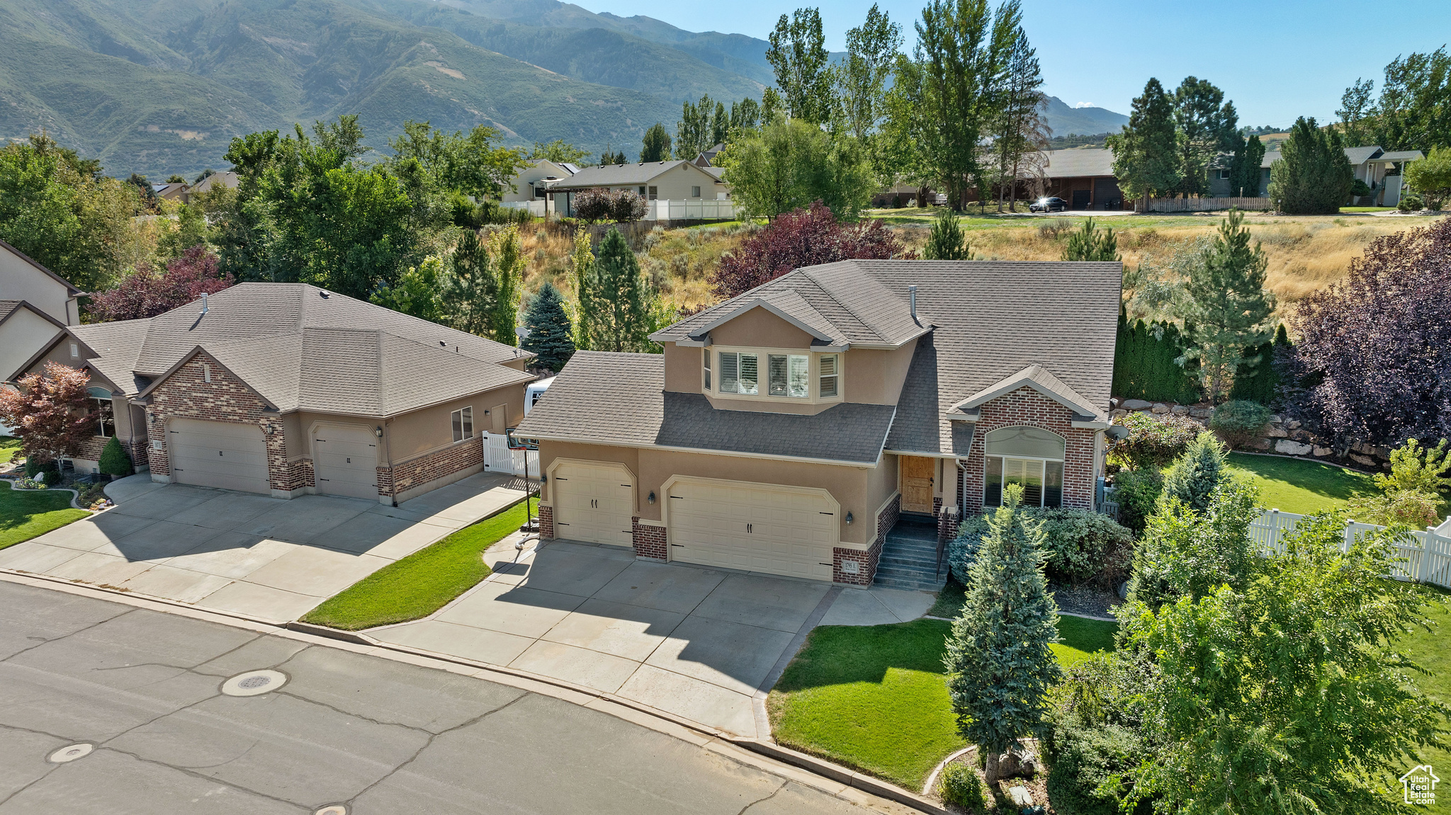 Exterior space with a mountain view and a garage