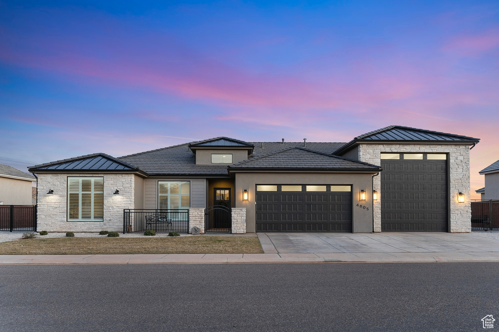 Prairie-style home featuring a garage