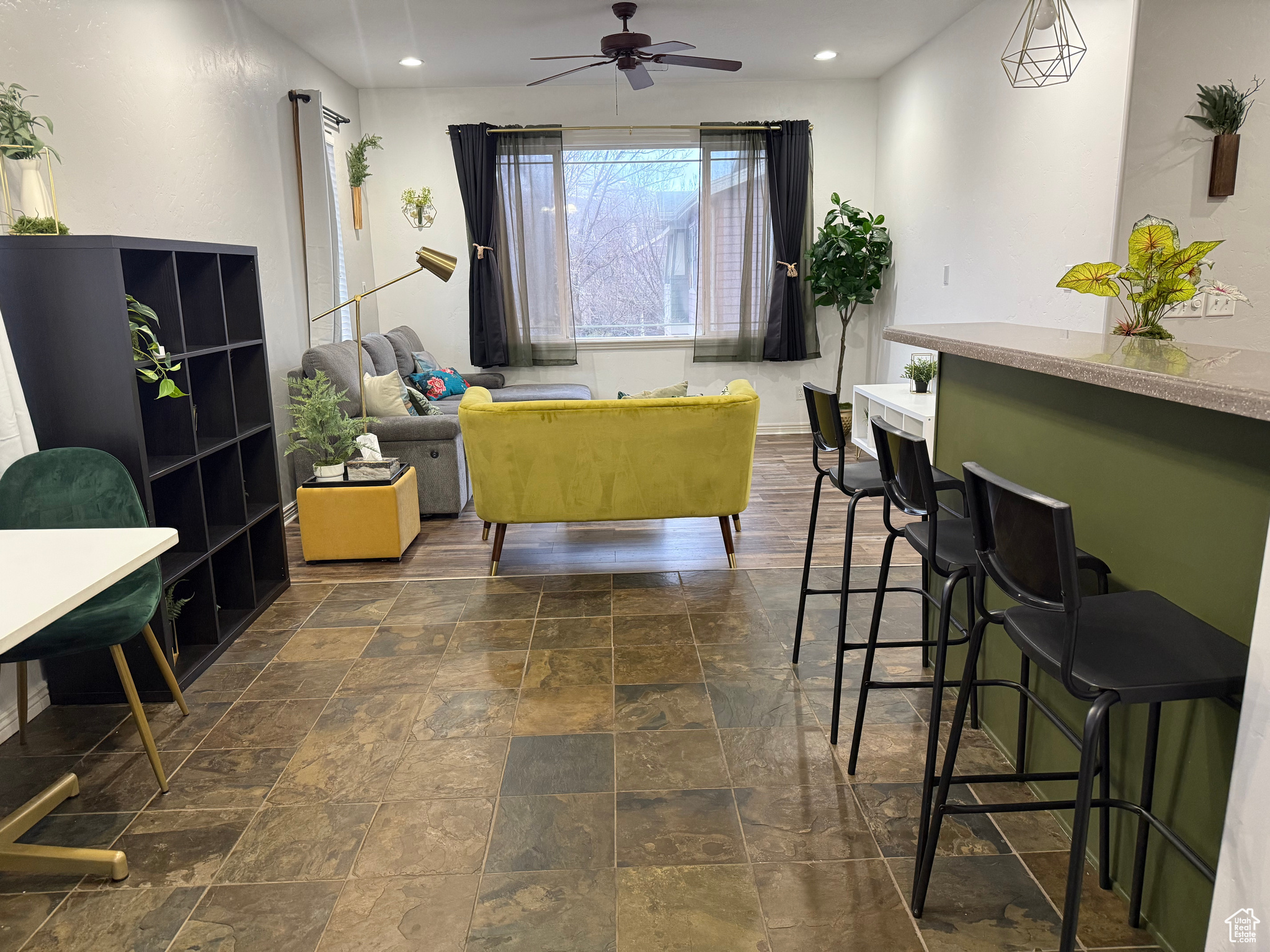 Interior space featuring ceiling fan