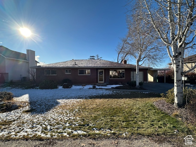 Back of house featuring a garage