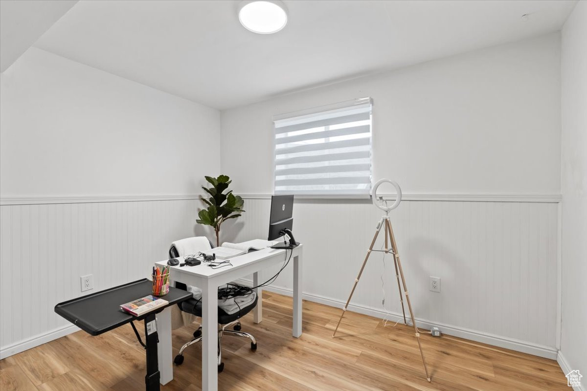 Office featuring wood-type flooring