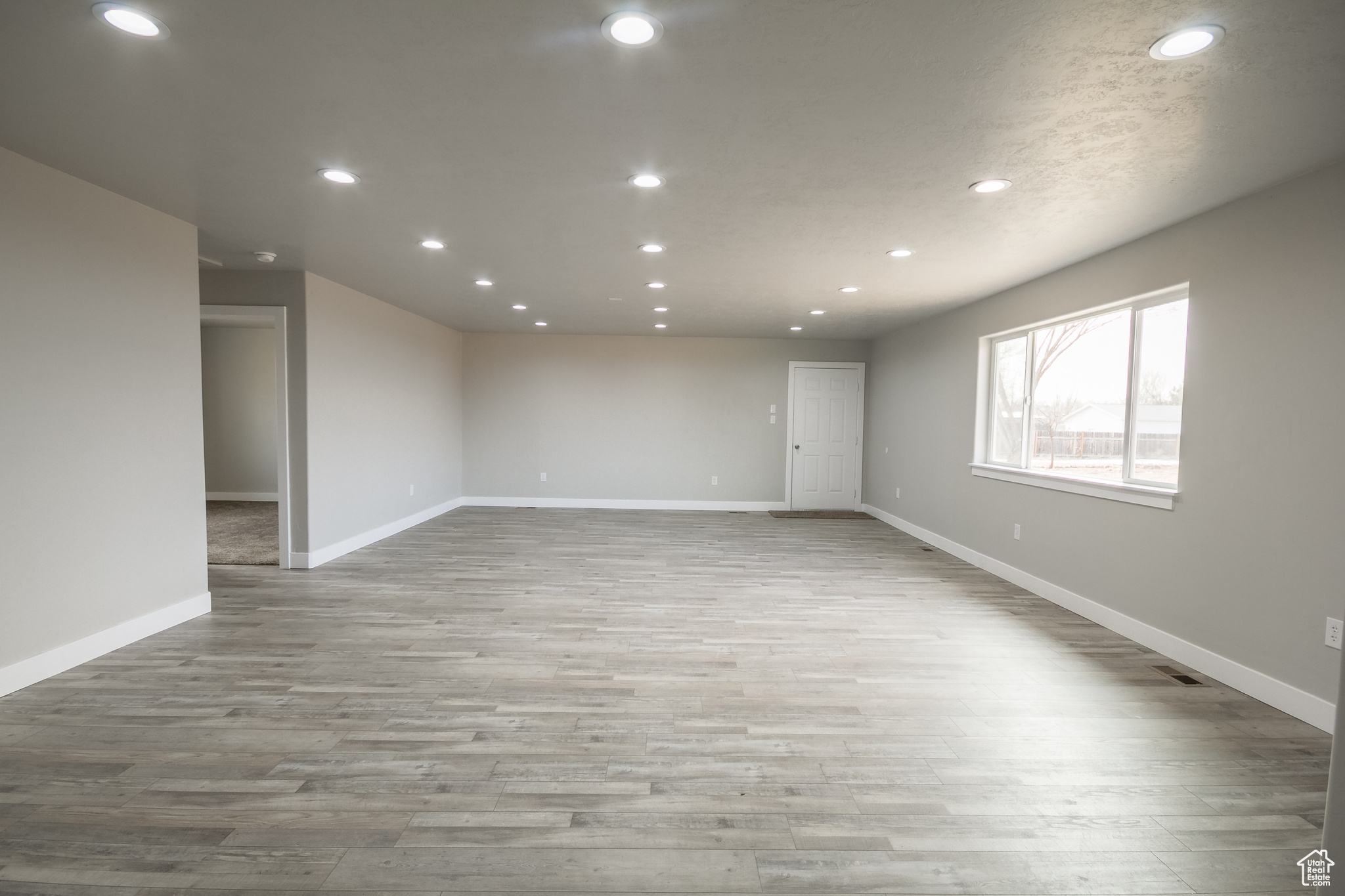 Unfurnished room featuring light hardwood / wood-style floors