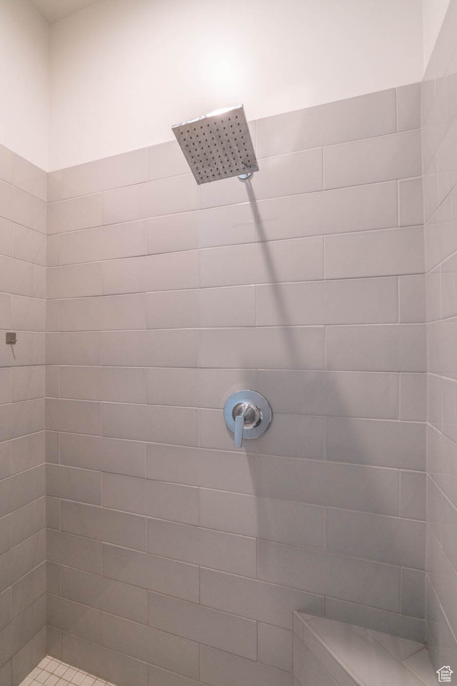 Bathroom with tiled shower