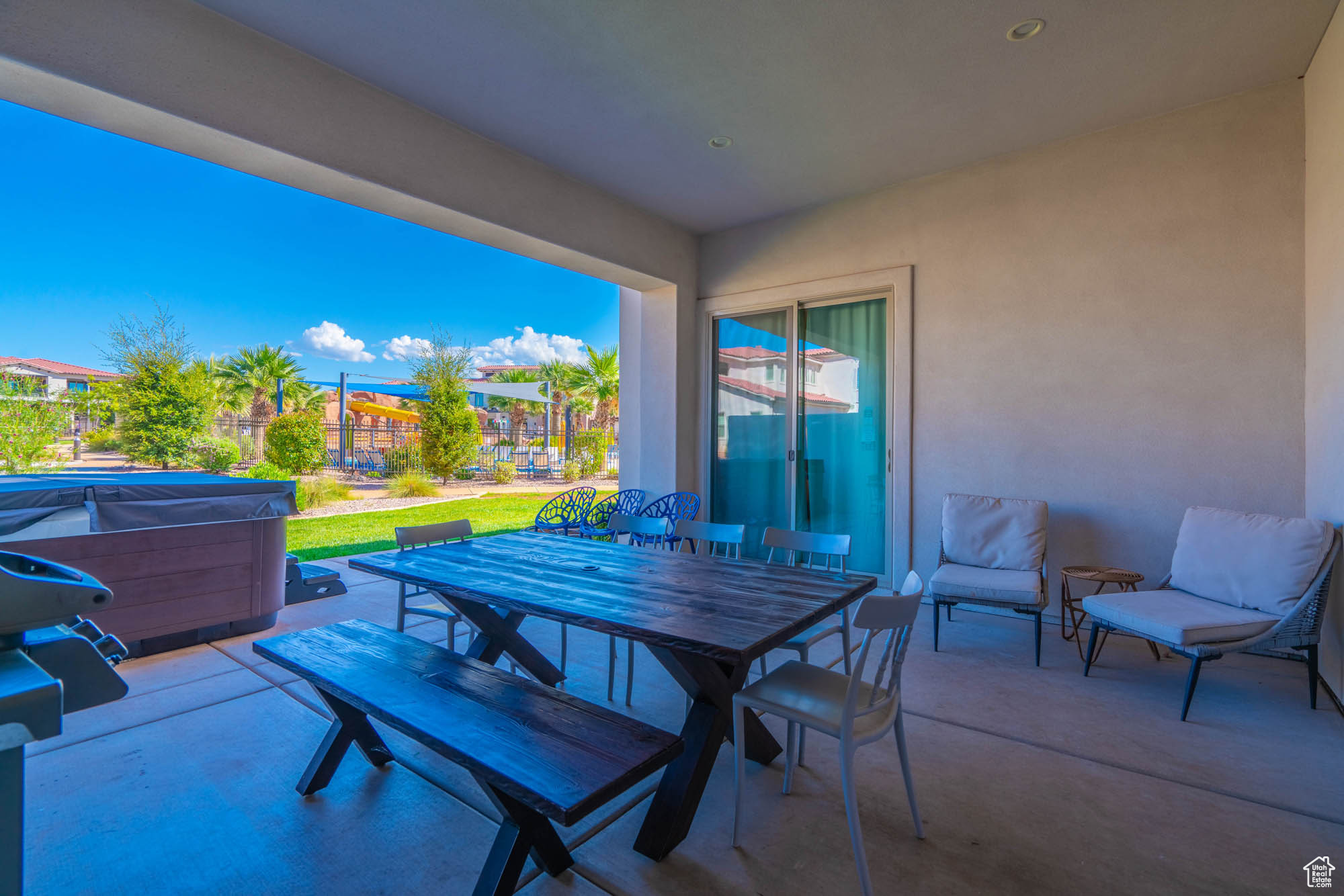 View of patio / terrace featuring a hot tub