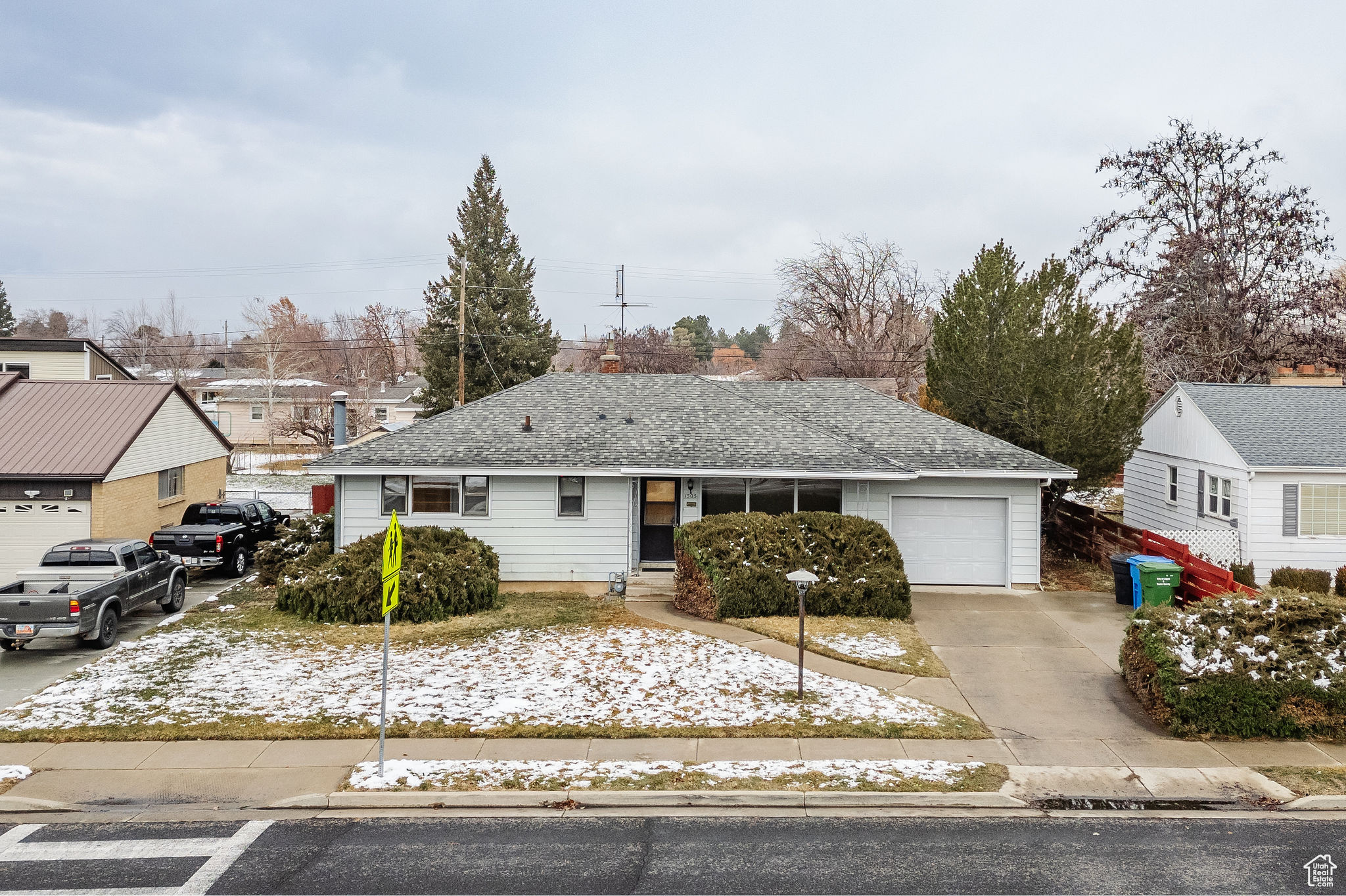 View of front of property with a garage