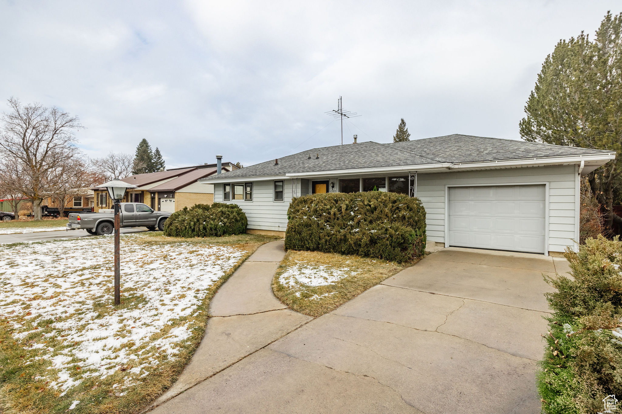 Ranch-style house featuring a garage