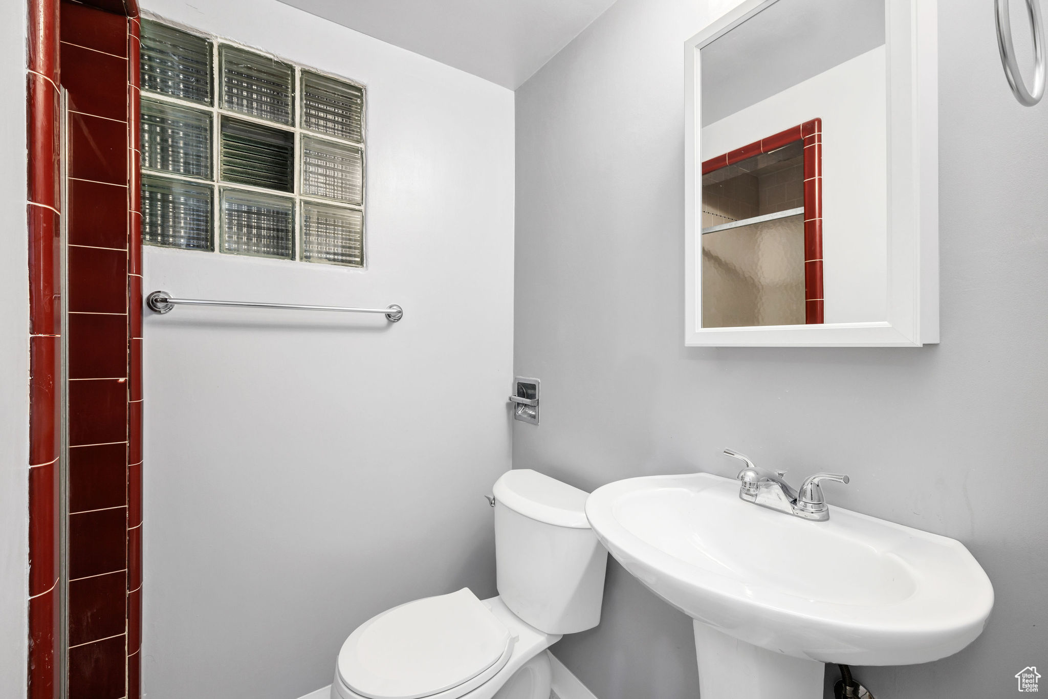 Bathroom featuring toilet and sink