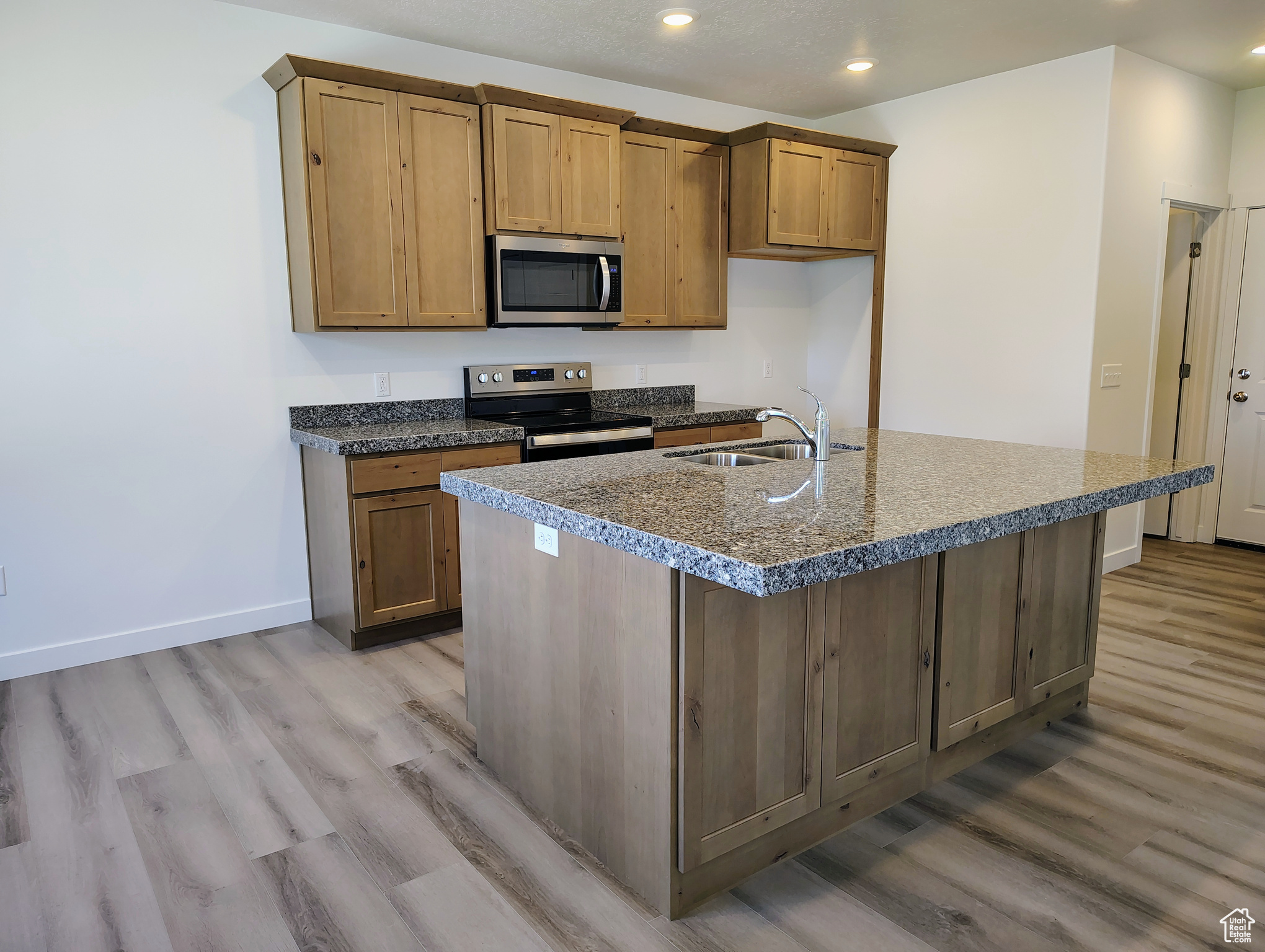 Knotty alder cabinets and granite countertops