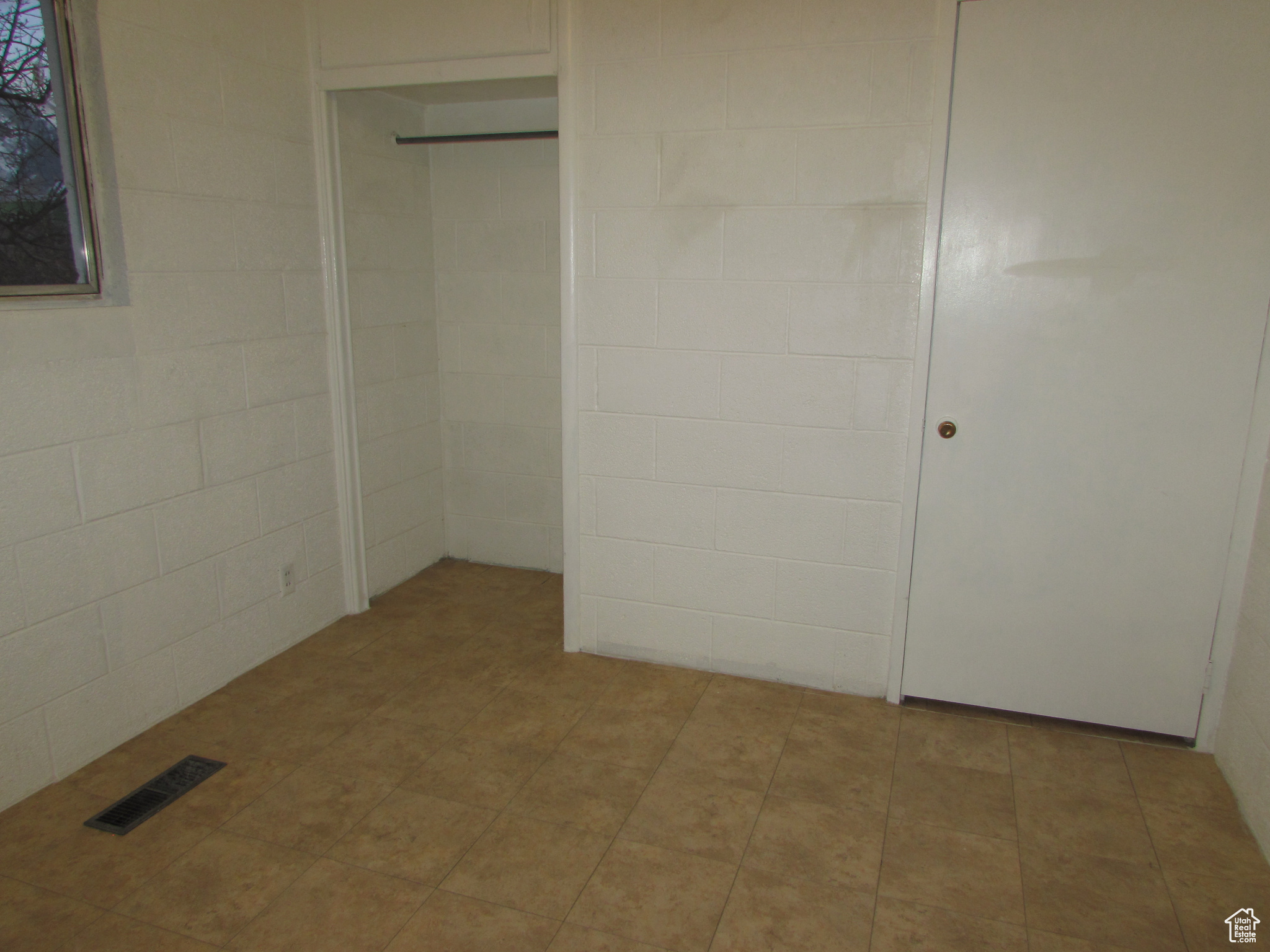 Apartment - Bedroom #2 with tile flooring and closet