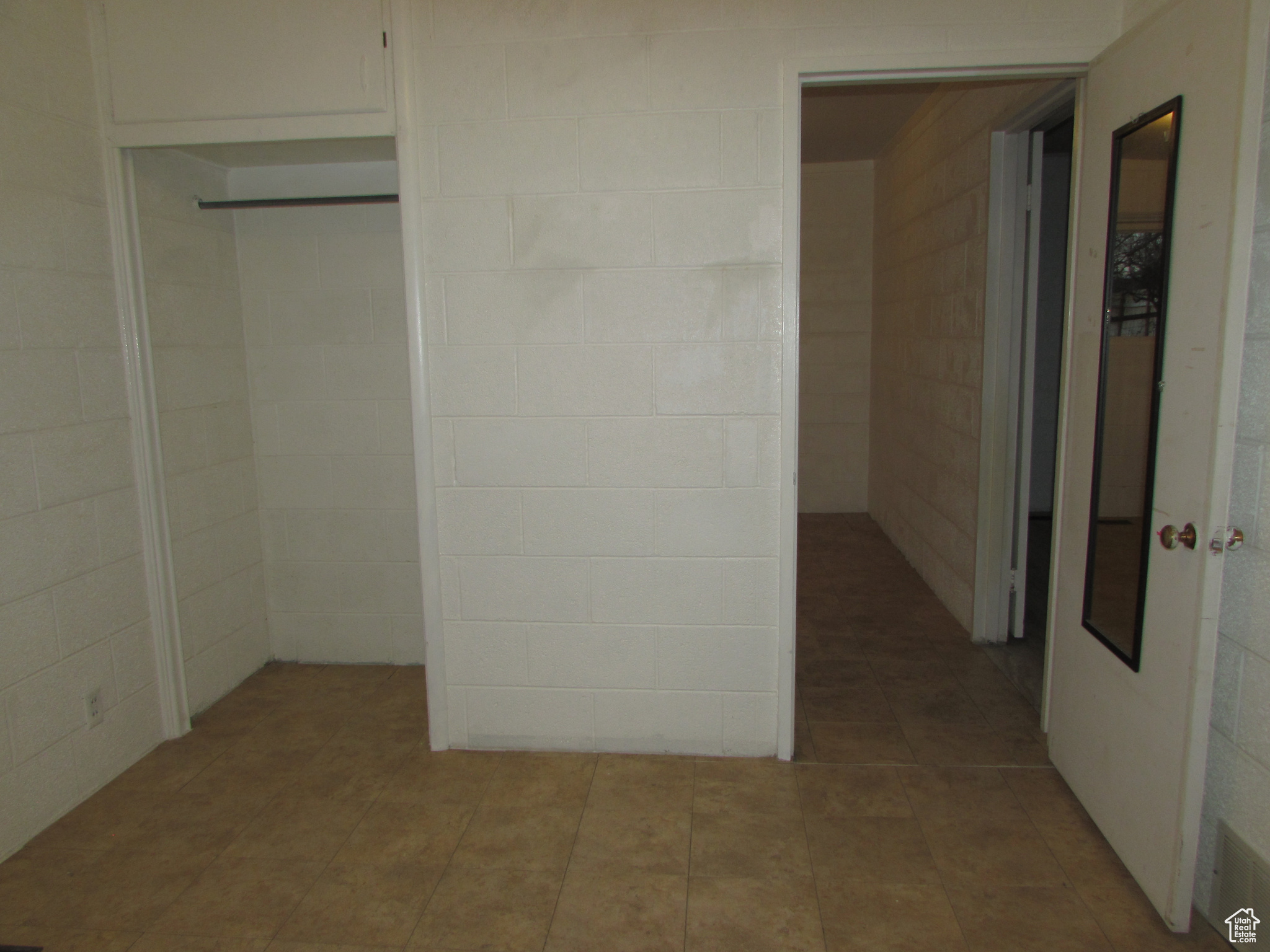 Apartment - bedroom #2 with tile flooring and a closet