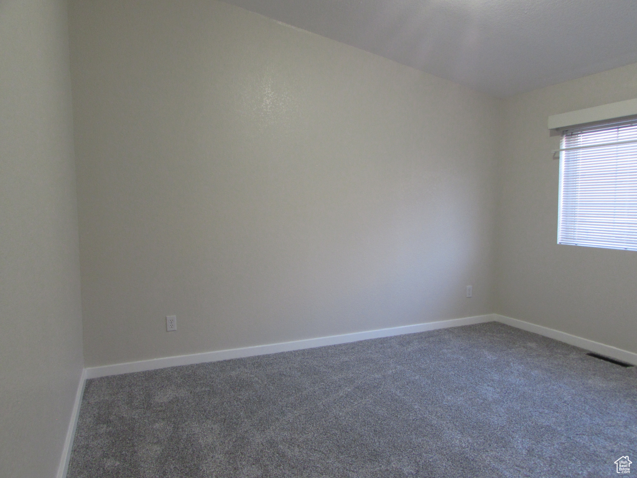 Bedroom #3 featuring new carpet and paint