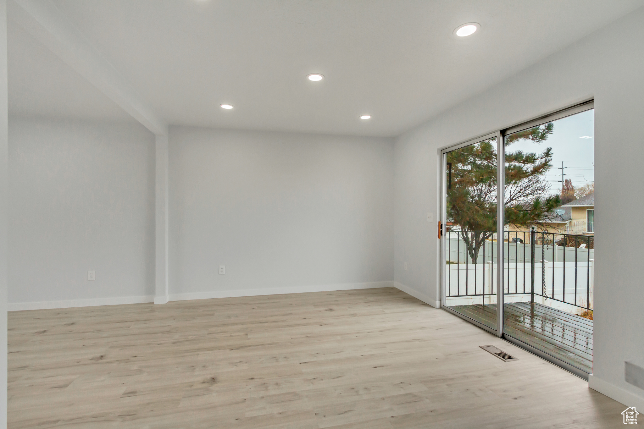 Empty room featuring light hardwood / wood-style flooring