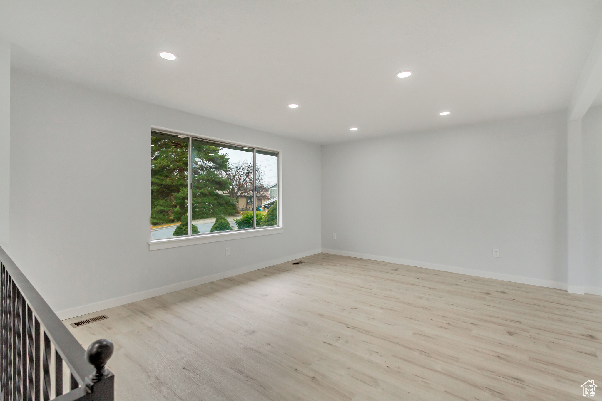 Spare room featuring light hardwood / wood-style flooring