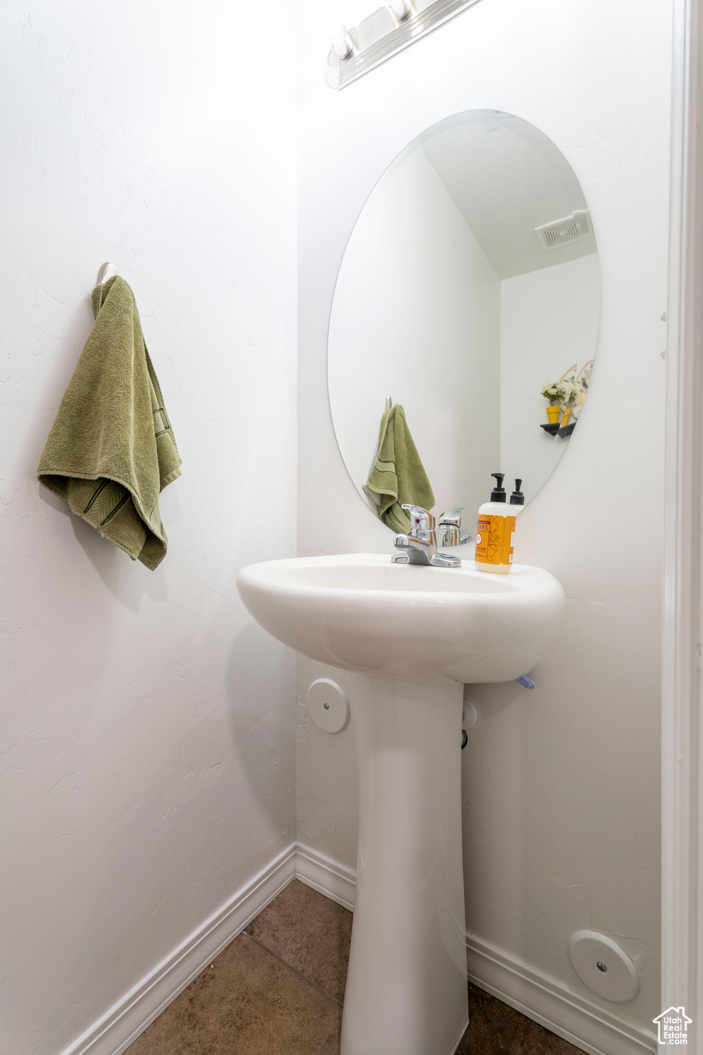 Bathroom featuring tile patterned flooring