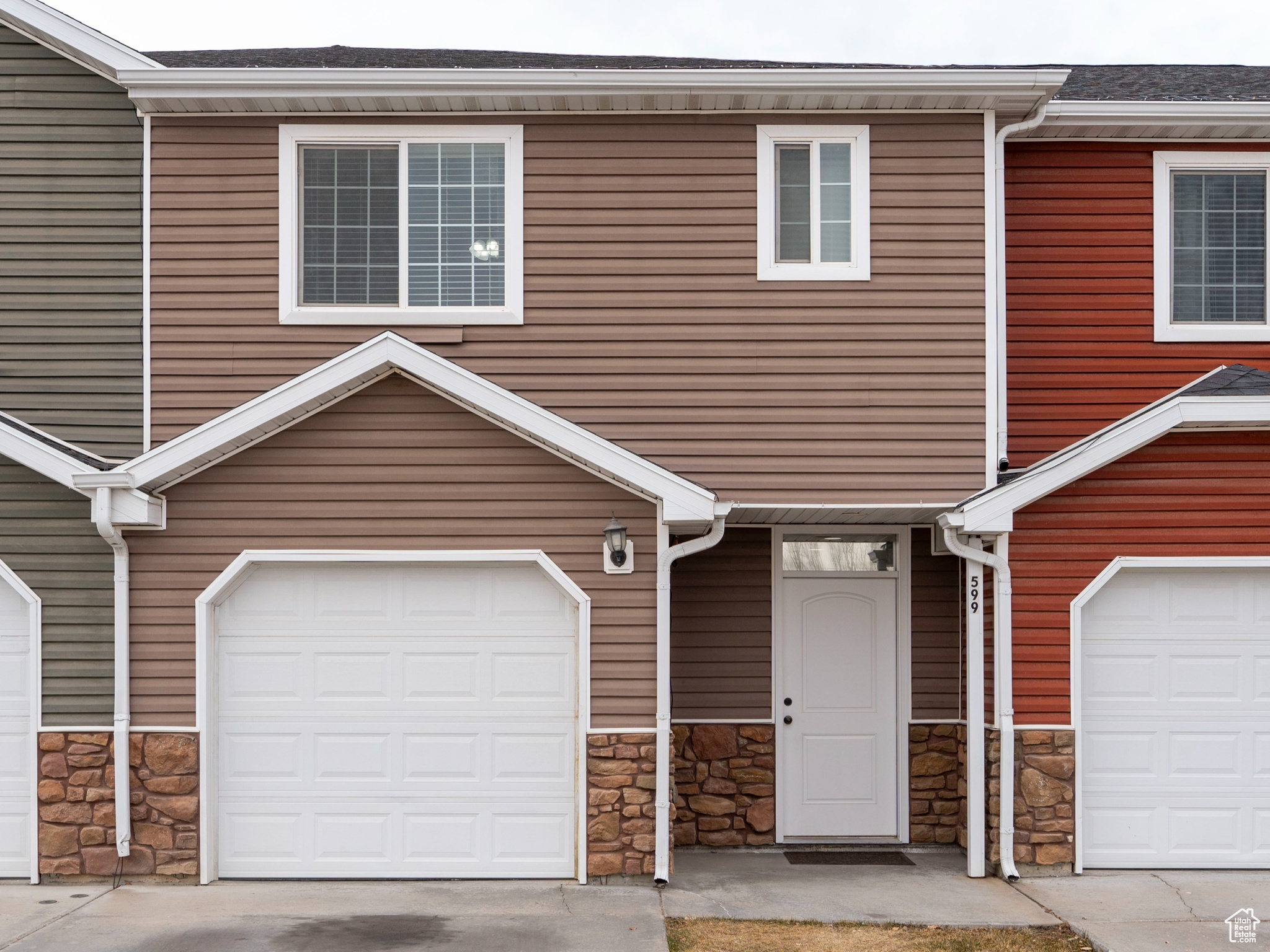 Multi unit property featuring a garage