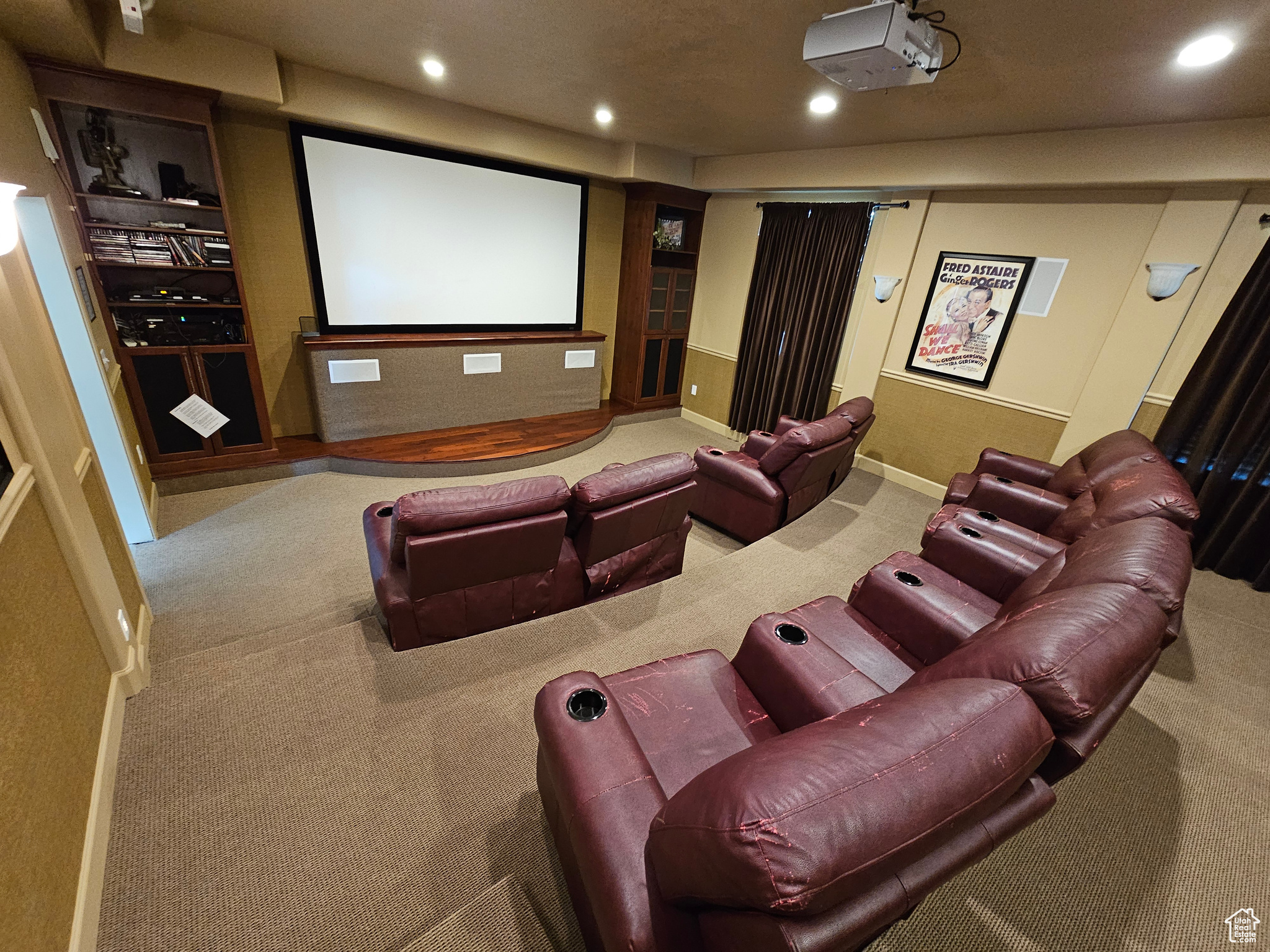 Home theater room featuring carpet floors