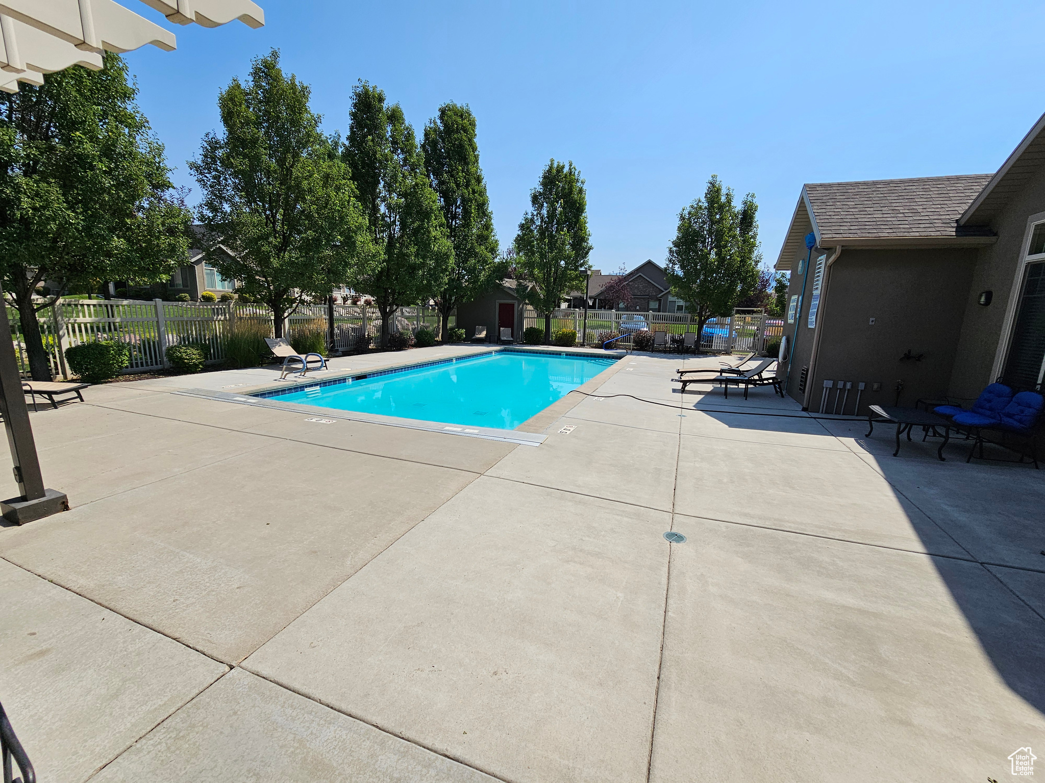 View of swimming pool with a patio