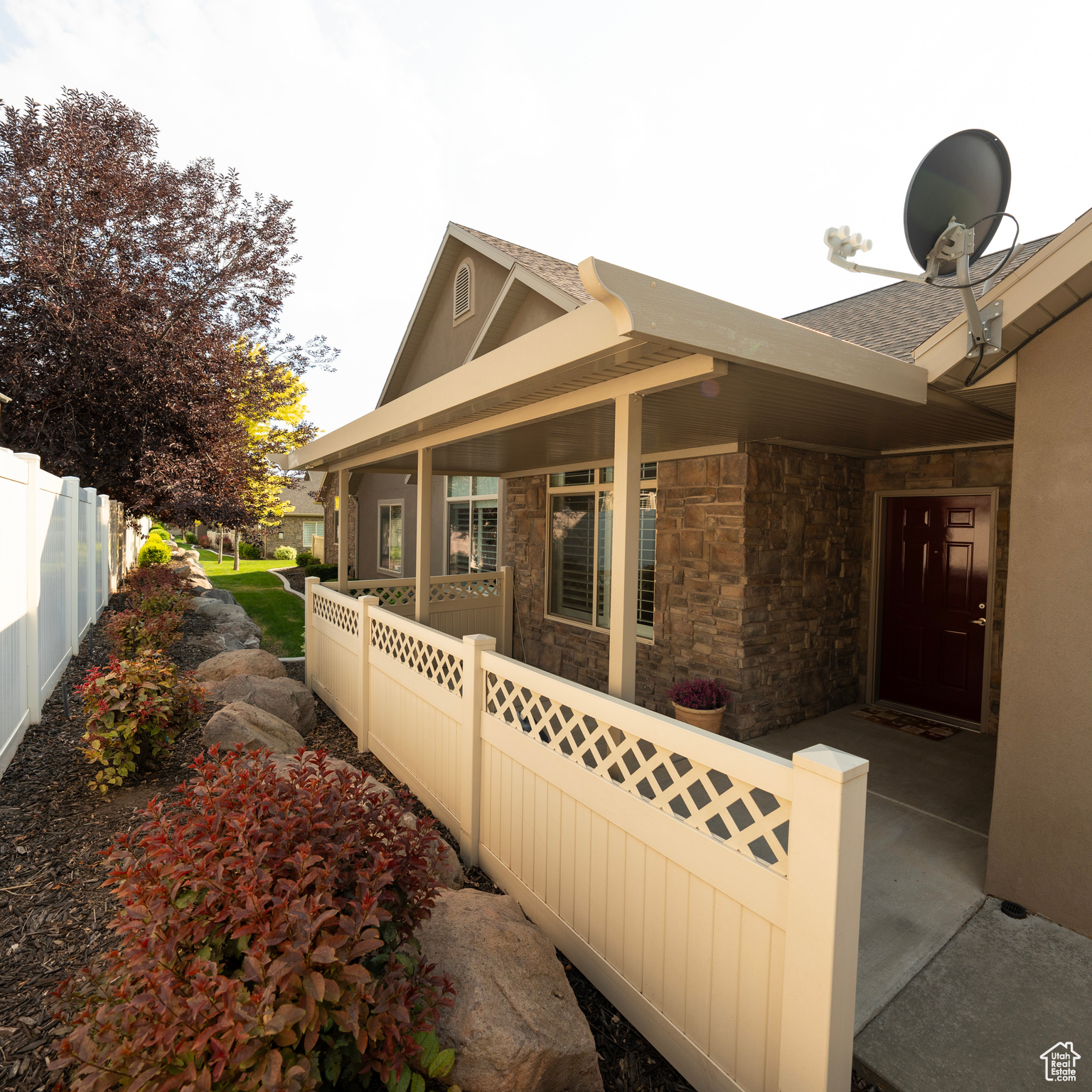 View of property exterior with a porch