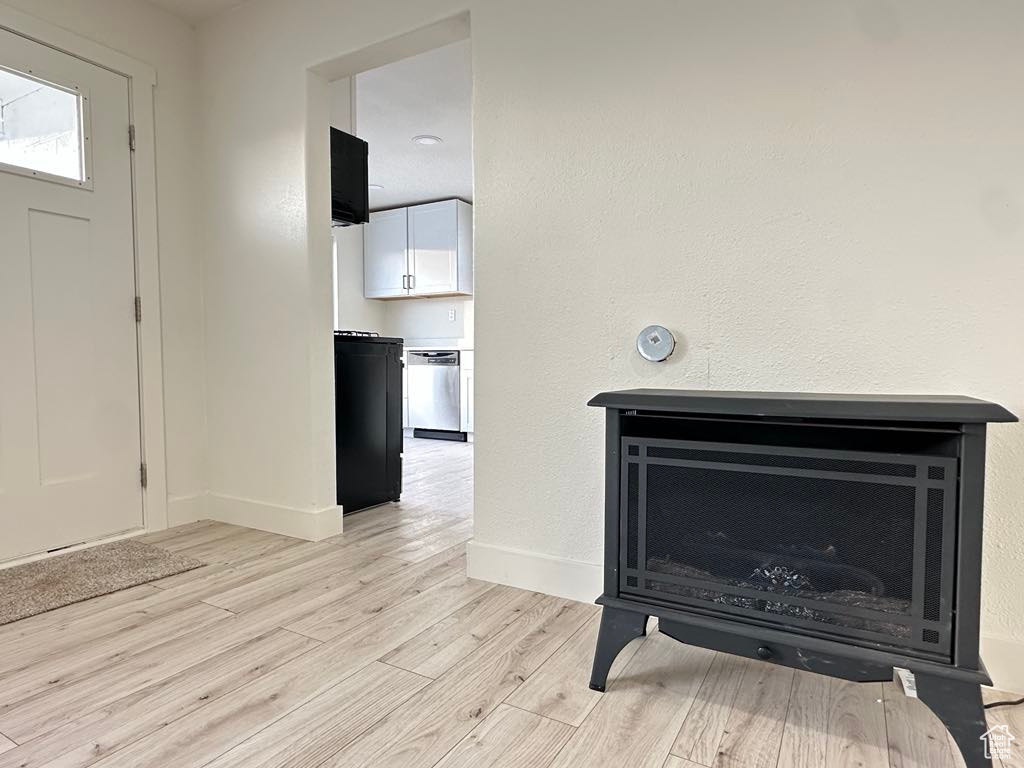 Interior details with dishwasher and hardwood / wood-style floors