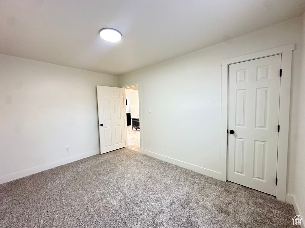 View of carpeted spare room