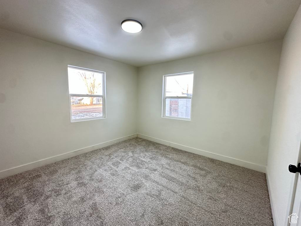 View of carpeted spare room