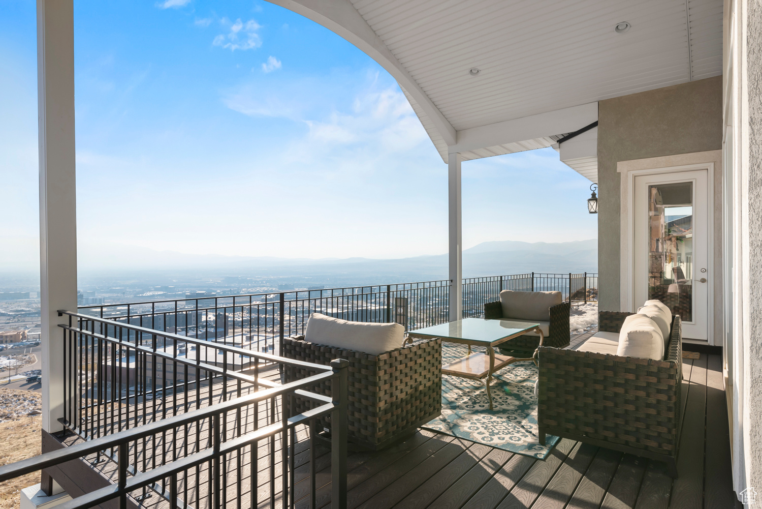 Deck off the Living Room and Kitchen. Can see across Utah Lake down to past Provo