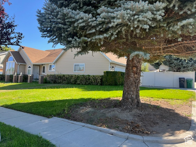 View of home's exterior featuring a lawn