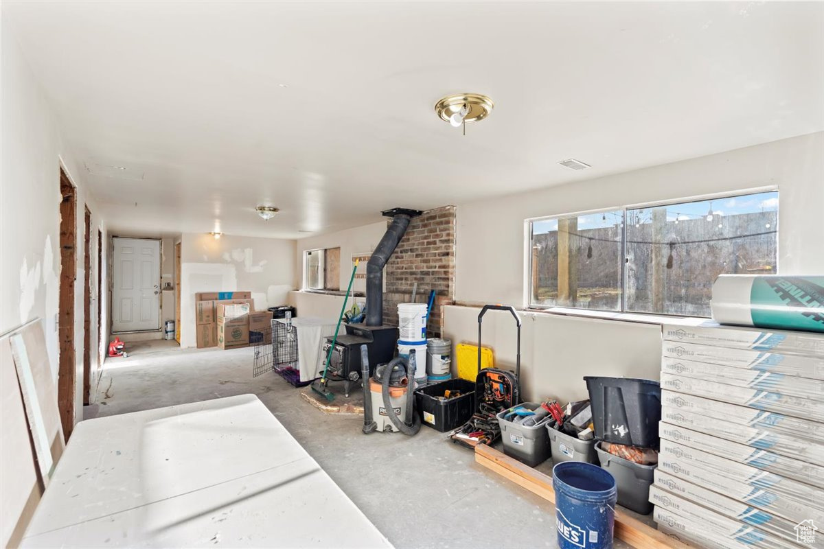 Basement featuring a wood stove