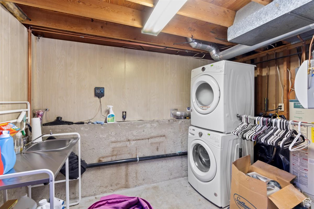 Laundry area with stacked washer / drying machine