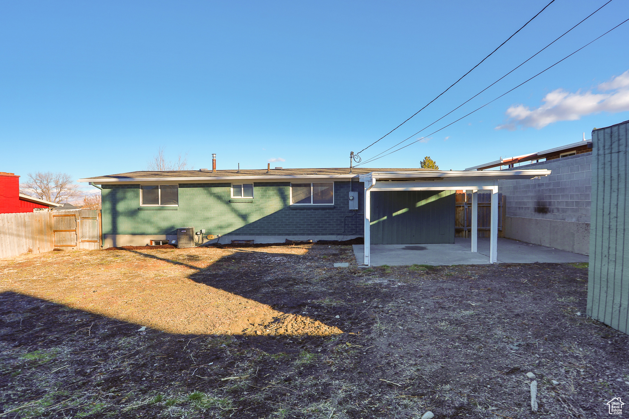 Rear view of property featuring a patio