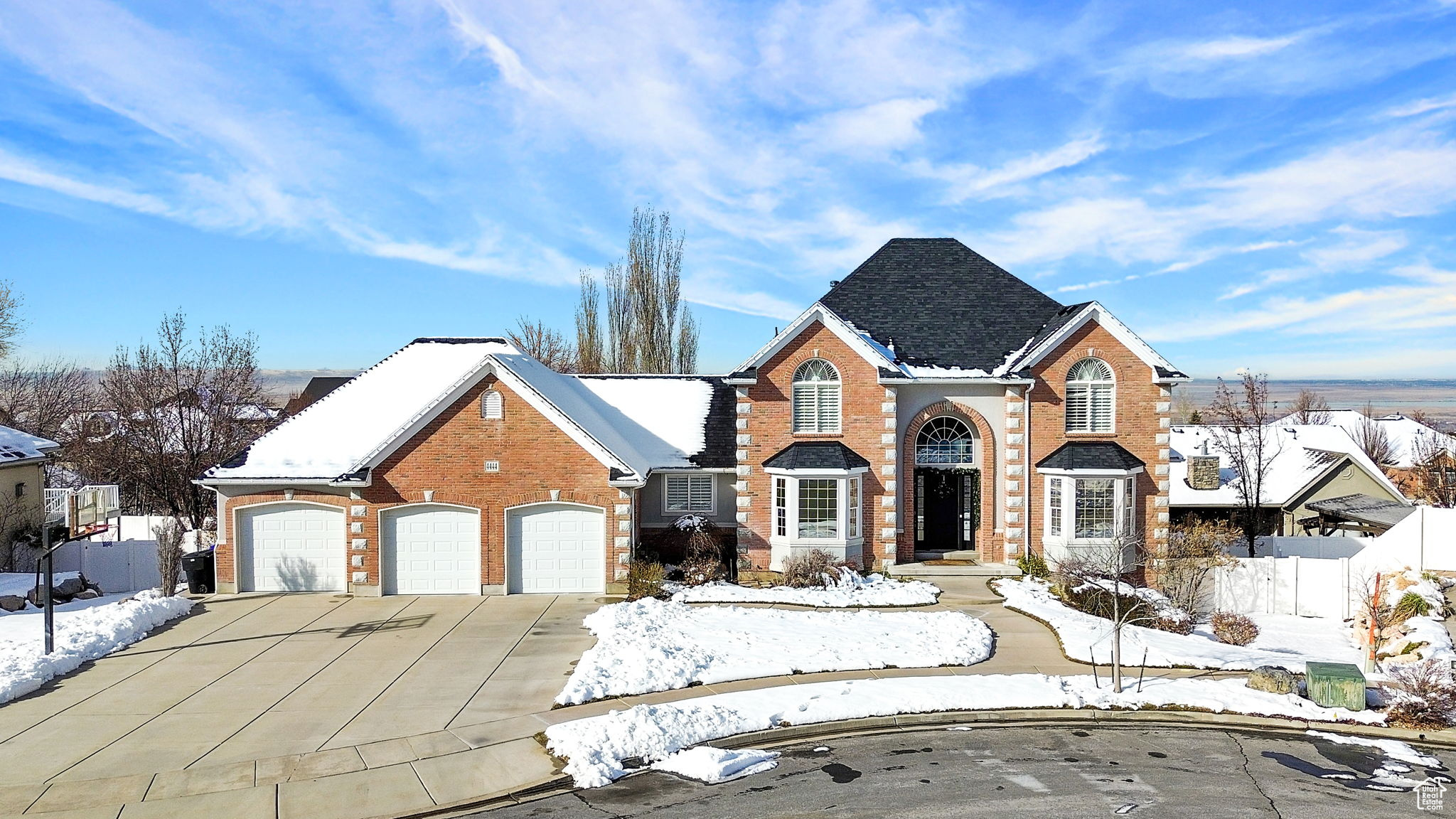 View of front property featuring a garage